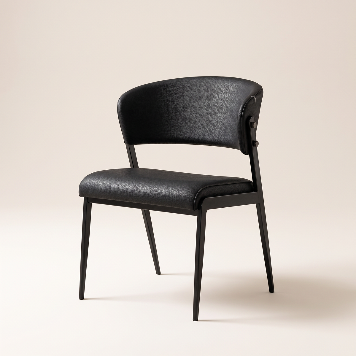 Noir Black Leather-Look Dining Chair, studio view