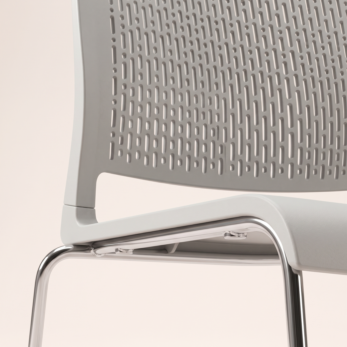 Grey Perforated Visitor Chair with Chrome Sled Base, material detail