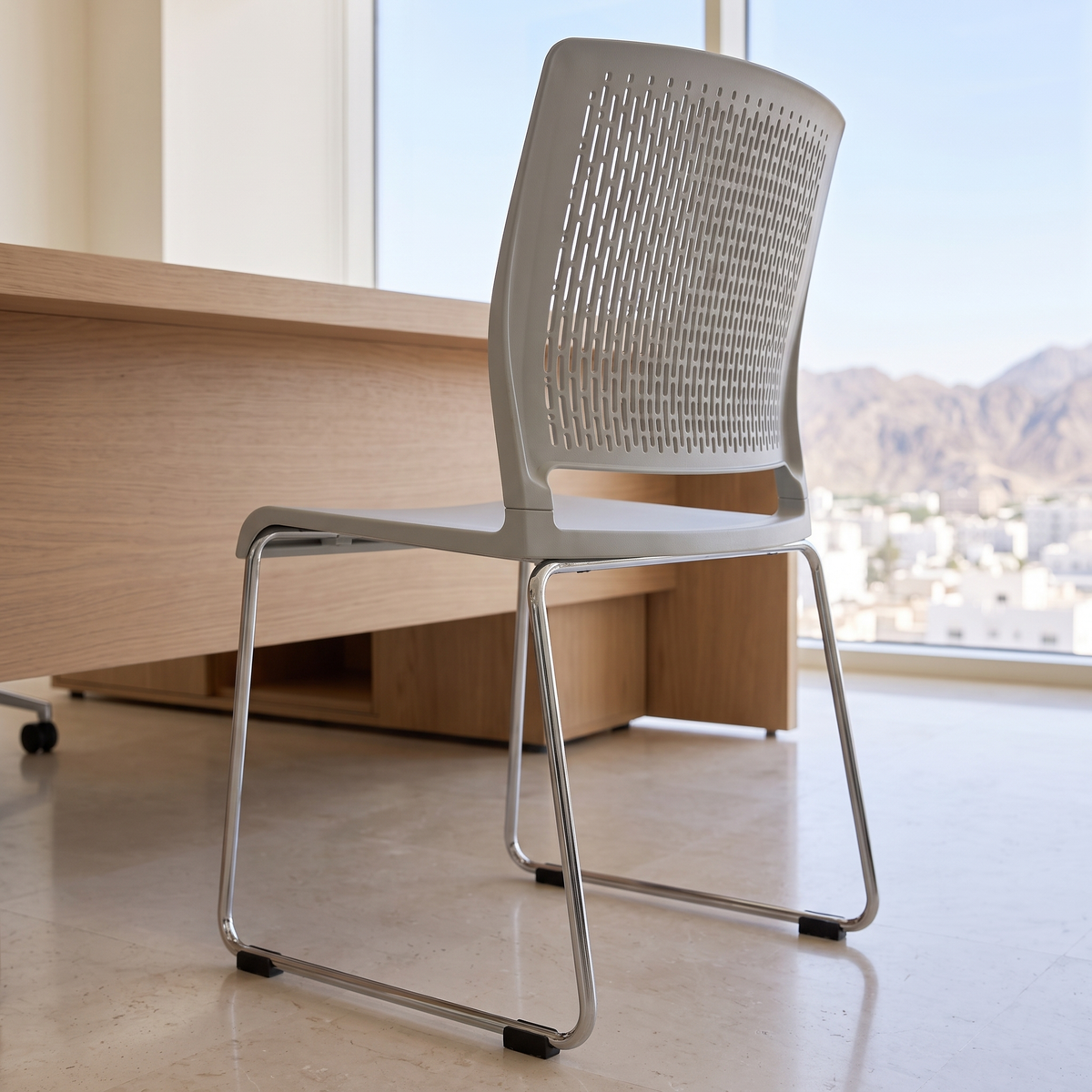 Grey Perforated Visitor Chair with Chrome Sled Base, close view