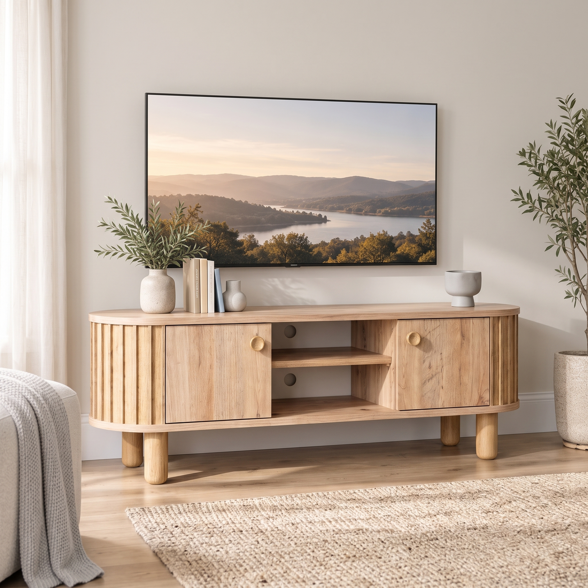 Sedir 150cm TV Stand in natural oak with fluted rounded corners in a bright Muscat living room