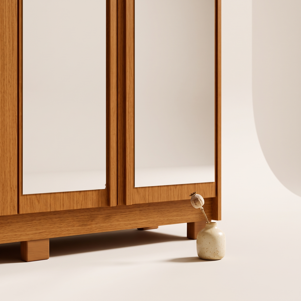 Ouro Verde 6 Door Wardrobe, mirrored doors and cinnamon plinth with a ceramic vase