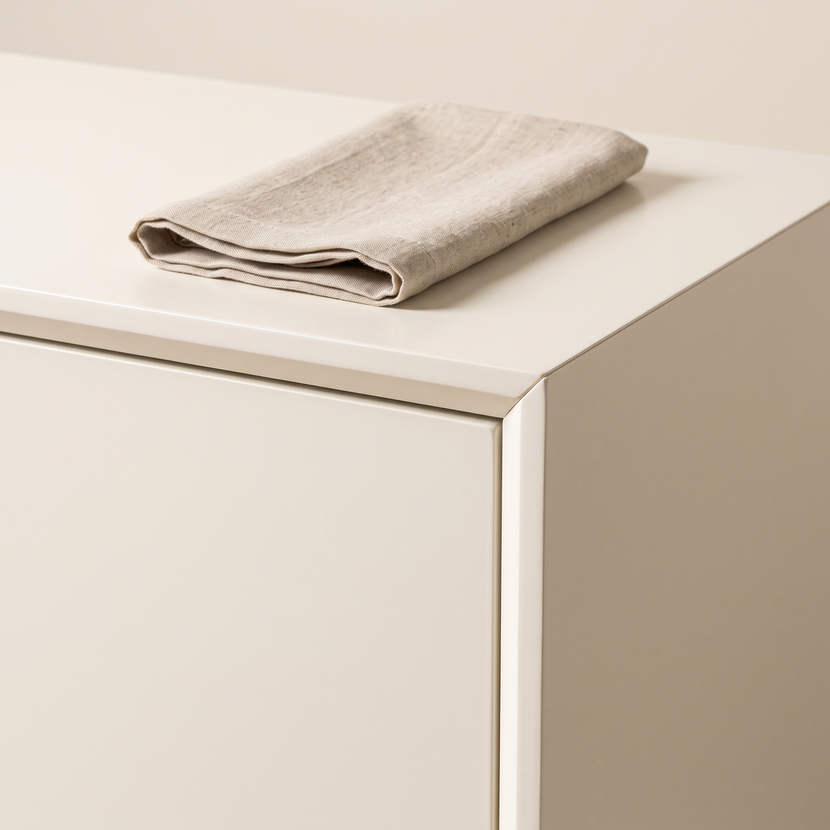 Jurere Freijo Buffet, ivory top corner with a folded linen napkin