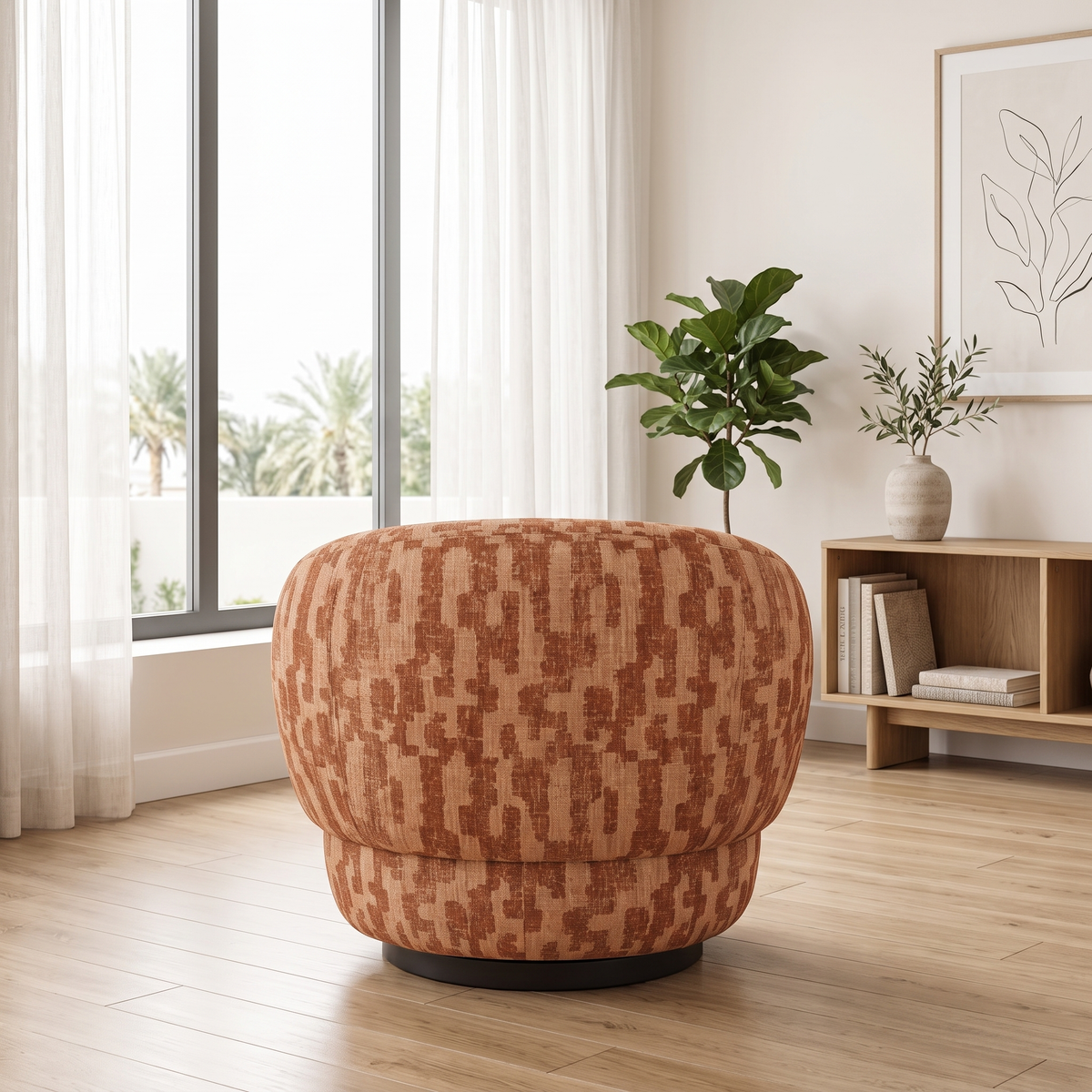 Rota armchair seen from behind, showing its rounded back and plinth base
