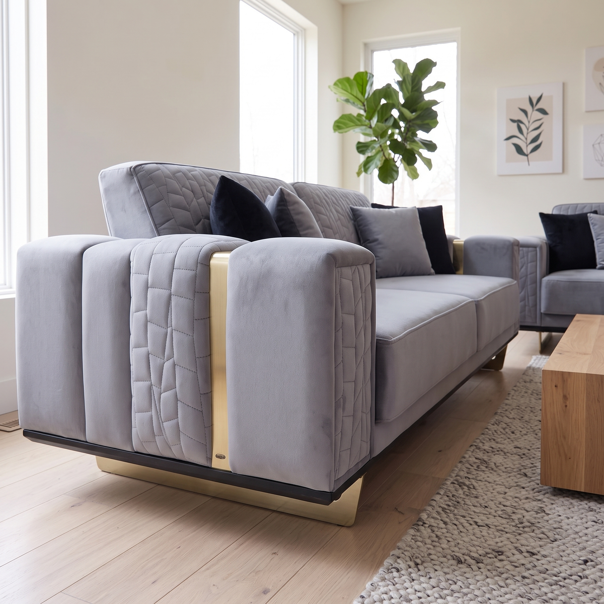 Close angled view of a Charisma three seater arm with its gold strip and sled leg