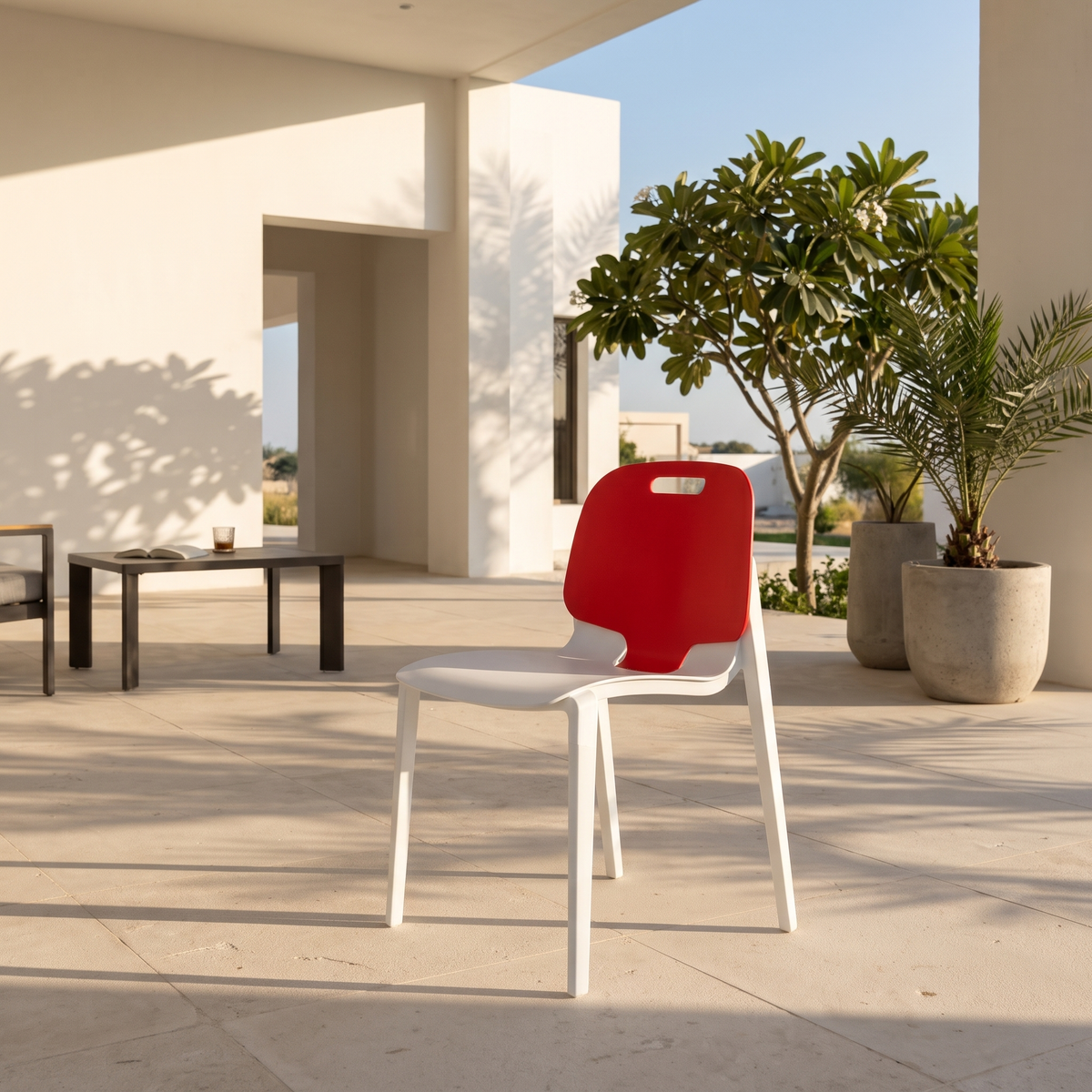 Red Plastic Garden Chair #CS02 in a Muscat home
