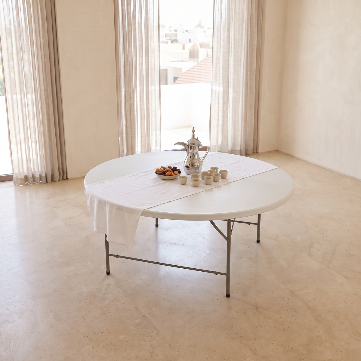 Round White Folding Garden Table #HP-170YZ with dallah coffee set, indoor room view